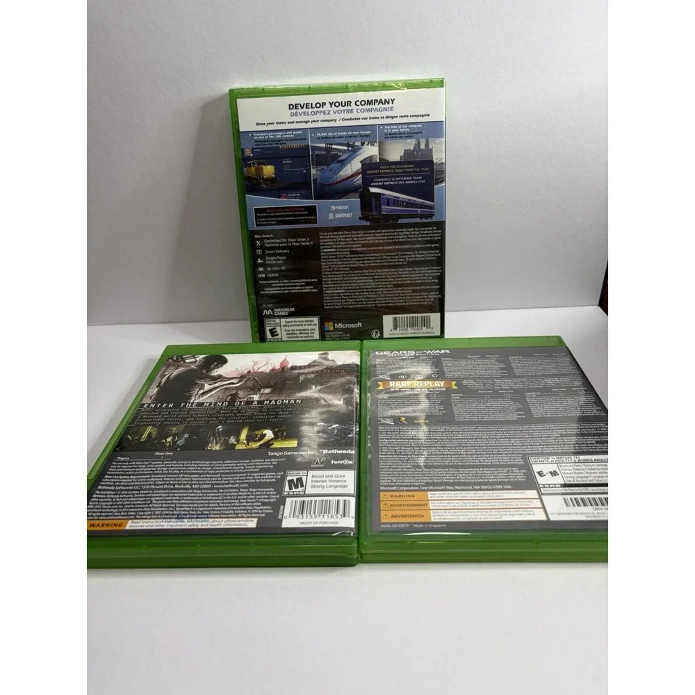 Microsoft Xbox One Game Lot Train Life Gears of War Rare Replay The Evil Within